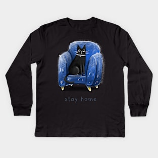 Cartoon black cat in a blue armchair and the inscription "Stay home". Kids Long Sleeve T-Shirt